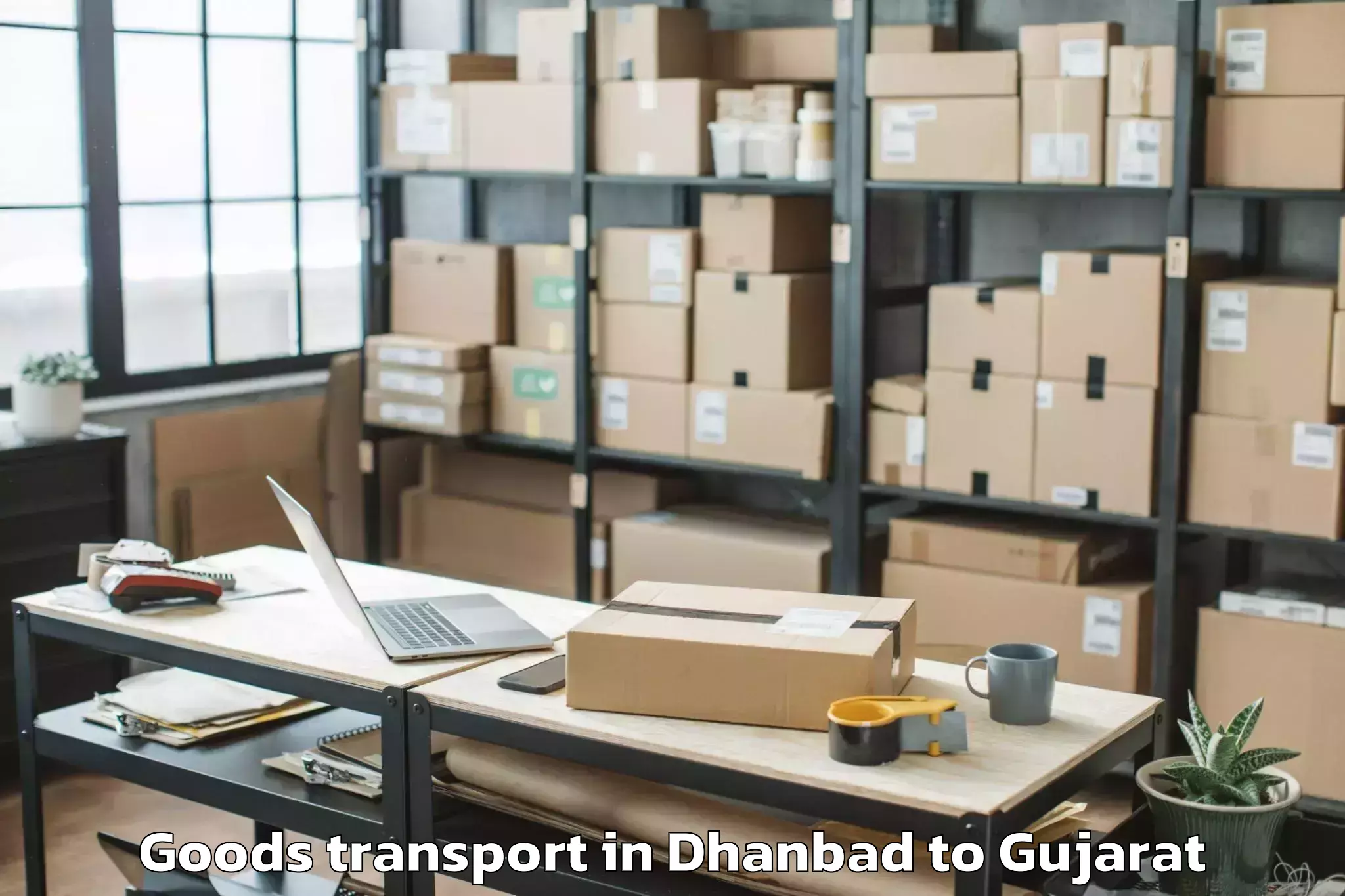 Expert Dhanbad to Khambhalia Goods Transport